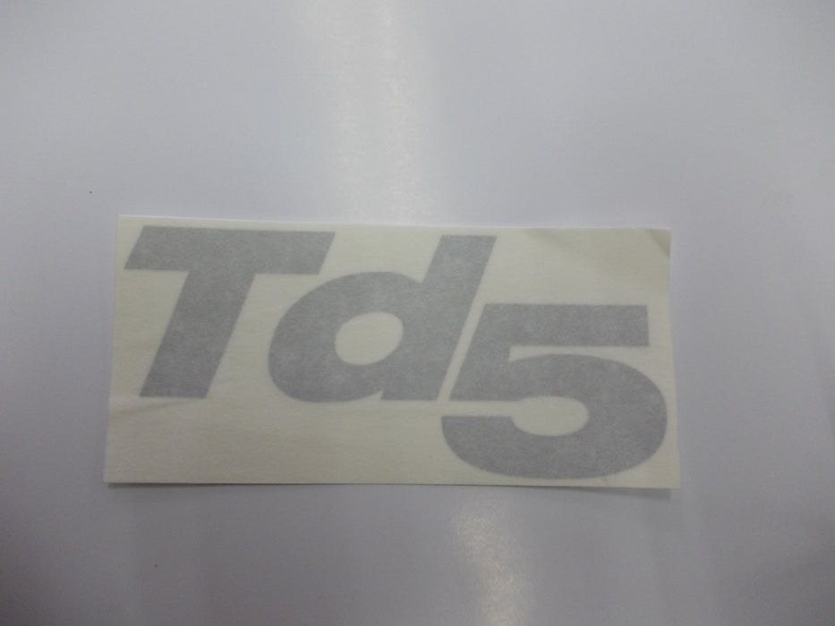 DAF105360MMG - decal "TD5" silver Body Part Land Rover Range Rover