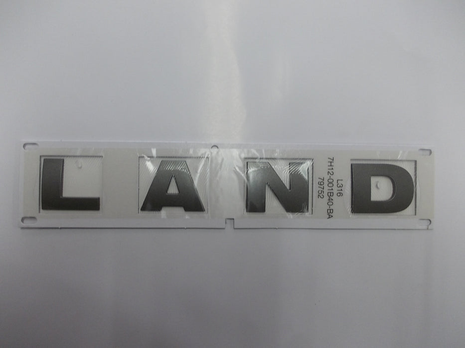 DAB500290 - Emblem – LAND – Silver – 28cm  by Land RoverBody Part Land Rover Range Rover Defender