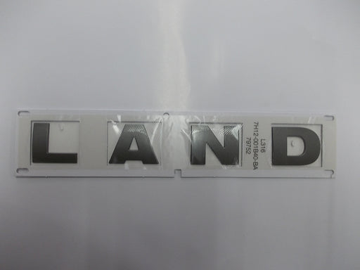 DAB500290 - Emblem – LAND – Silver – 28cm  by Land RoverBody Part Land Rover Range Rover Defender