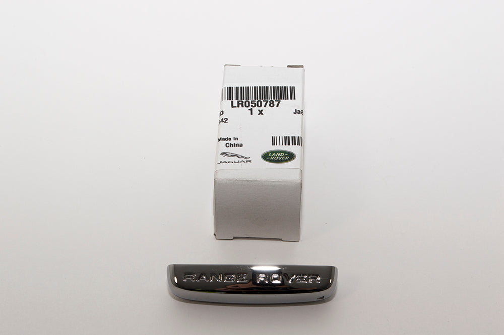 LR050787LR - Chrome End Cap - Key Fob  by LAND ROVERElectrical Part Land Rover Range Rover 